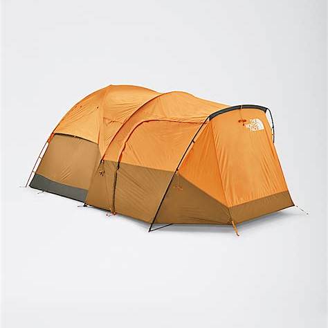 Top 2025 Family Camping Tents: Picks for Every Budget and Adventure 2 The North Face Wawona 6 tent featuring a spacious design with three connected sections and an orange exterior.