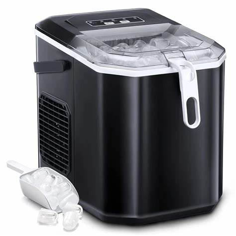 A black portable ice maker with a transparent top, controls on the lid, and a scoop beside it, featuring ice cubes inside.